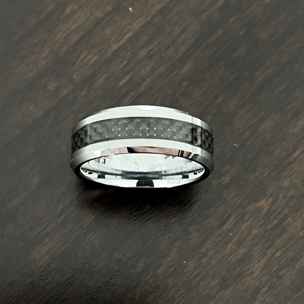 Triton tungsten carbide ring with carbon fiber inlay. Size 11.
